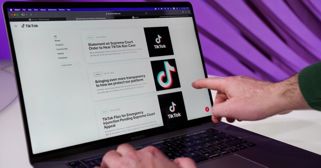 Close-up of a person interacting with TikTok content on a laptop indoors.