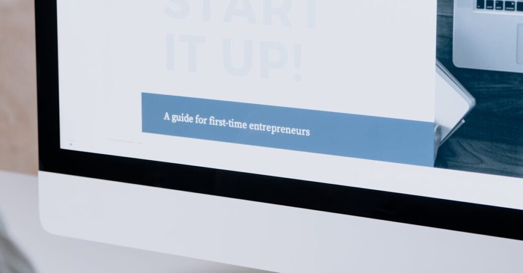 Person working on a website design for first-time entrepreneurs on a desktop computer.