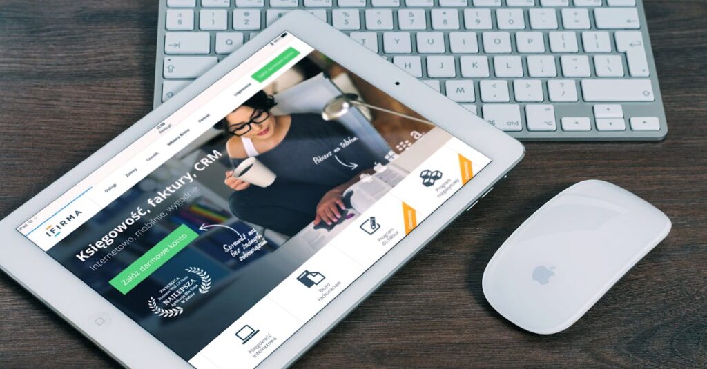 A tablet with a financial website open, alongside a white keyboard and mouse. Ideal for tech-theme stock images.