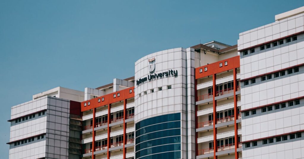 Low angle shot of Telkom University's building facade in Bandung.