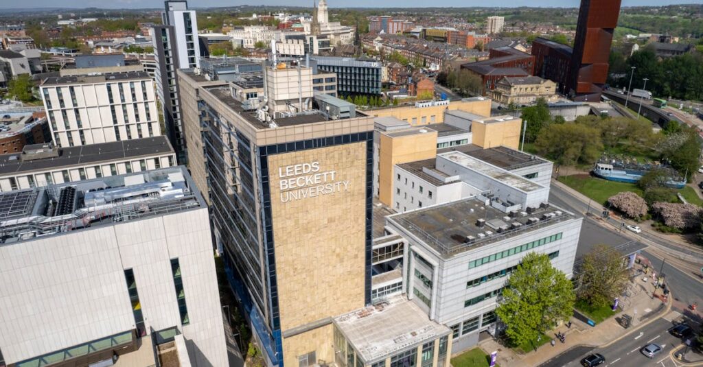 A detailed aerial view of Leeds Beckett University in Leeds, England, showcasing urban architecture.