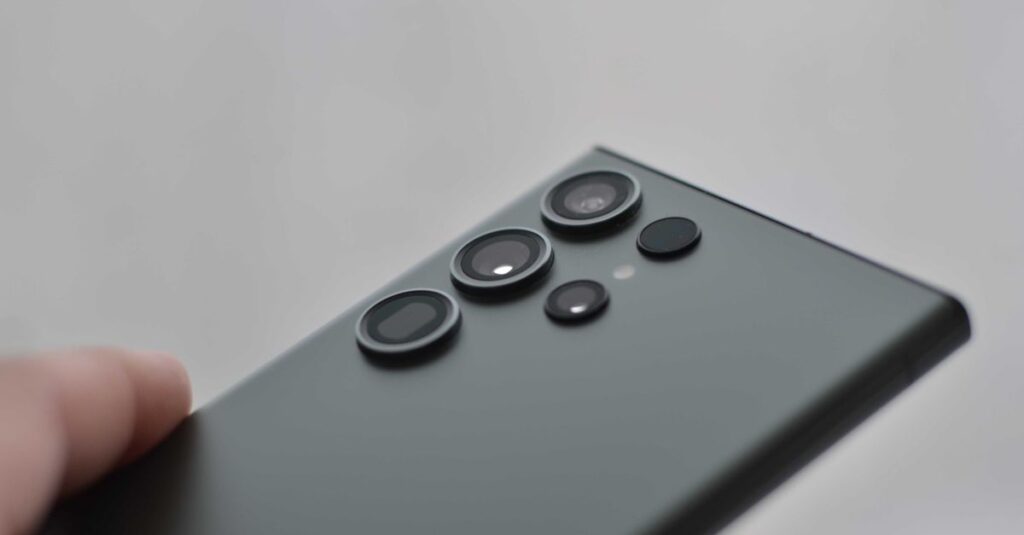 Detailed close-up of smartphone camera lenses, ideal for tech visuals.